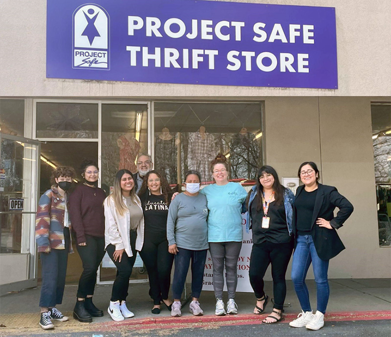 Edward Delgado-Romero with student group at Project Safe Thrift Store