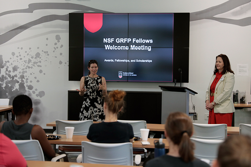 Meredith Welch-Devine addresses the welcome meeting of NSF-GRFP students